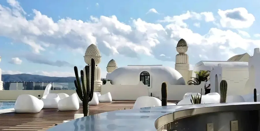 White rooftop terrace built on dome-roof hospitality architecture